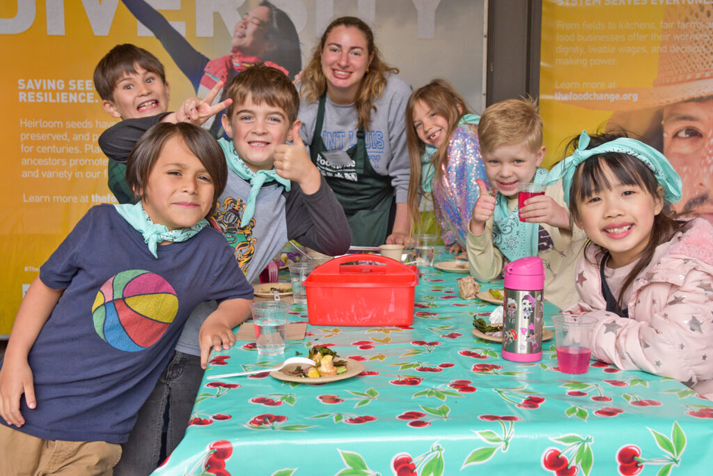 A group of Foodwise Kids gathered around a table